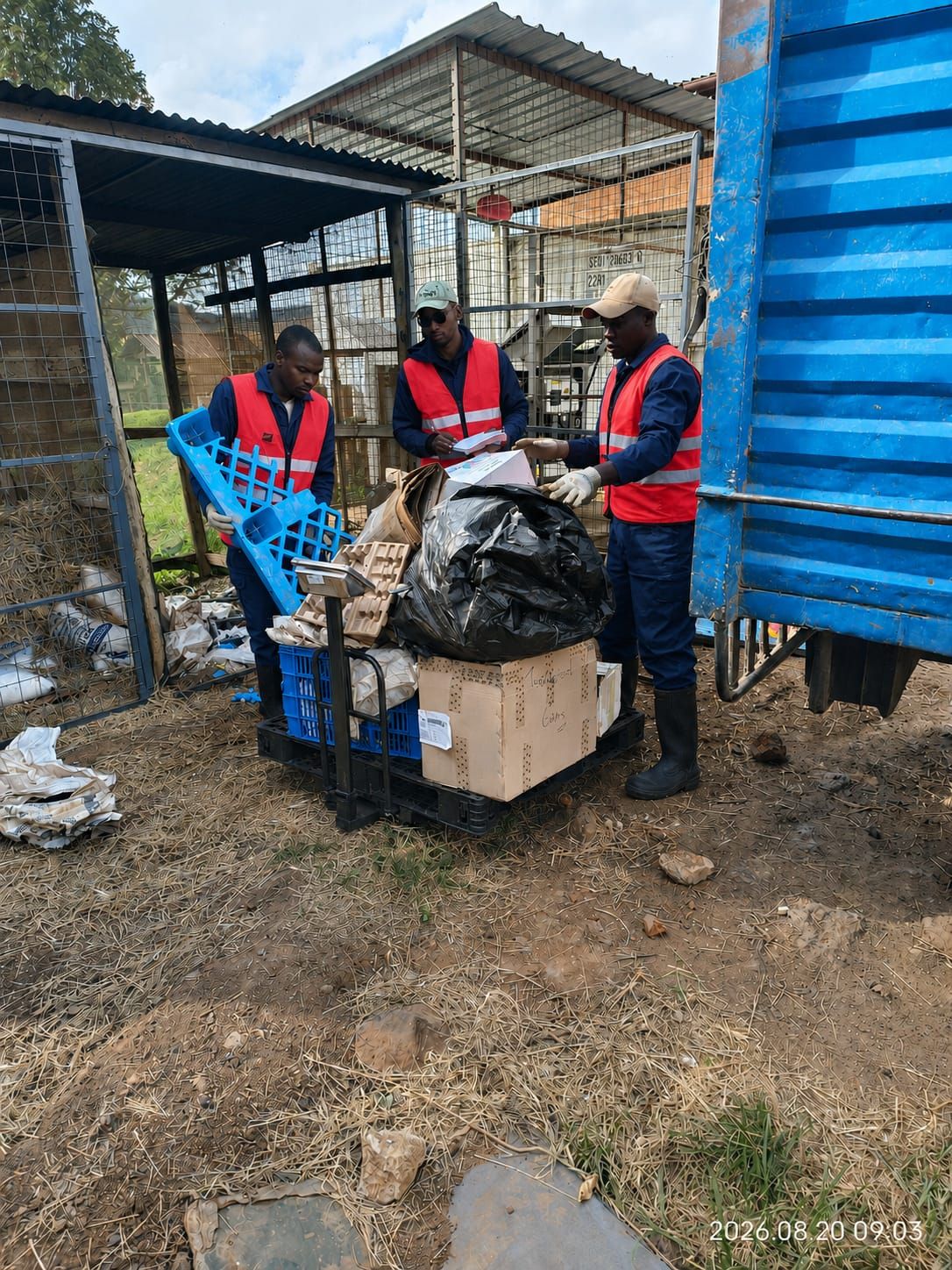 Polypac Traders crew weighing and logging a collection